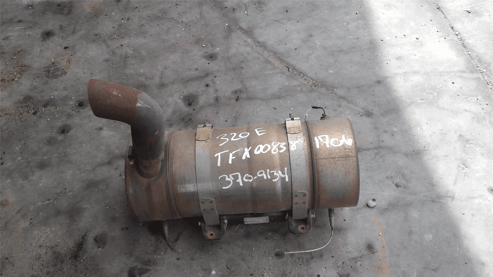 USED MUFFLER image 1